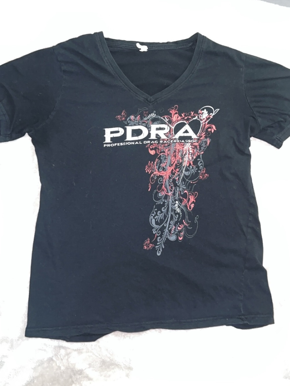 Anvil Black Tee with Pink Logo Tag and Red Graphic Accents